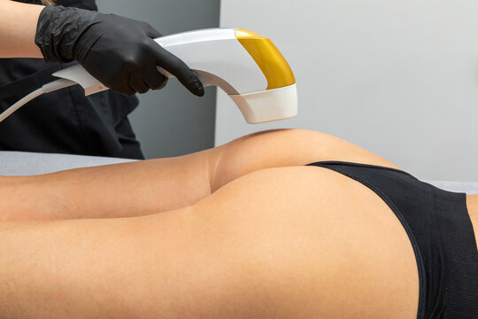 Close up non-surgical ultrasound SMAS lifting procedure in spa salon. Non-invasive therapy for figure shaping and correction, fat burning, excess weight loss in special beauty clinic