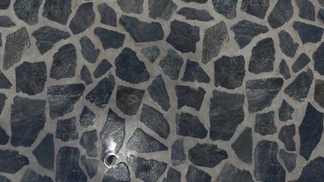 Grey Slate Stone Pavement Texture in the Rain Top View Background