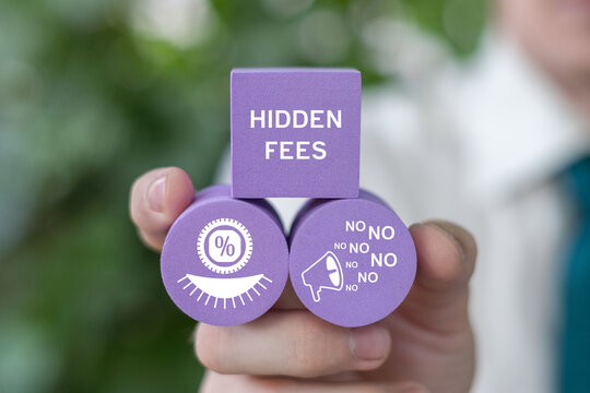 Business person holding violet blocks with icons sees the text NO HIDDEN FEES. Concept of no hidden fees.