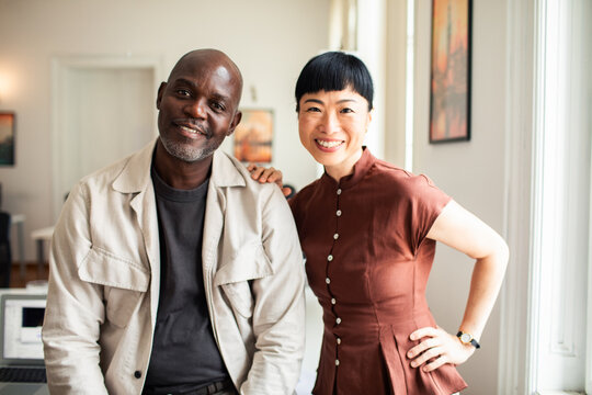 Smiling coworkers portrait in bright home office