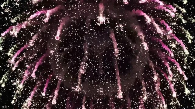 Bright blue firework shell ascending into the dark night sky. Bursting into pink and green sparkling trails. Cinematic celebration stock video footage for festive events and holiday displays