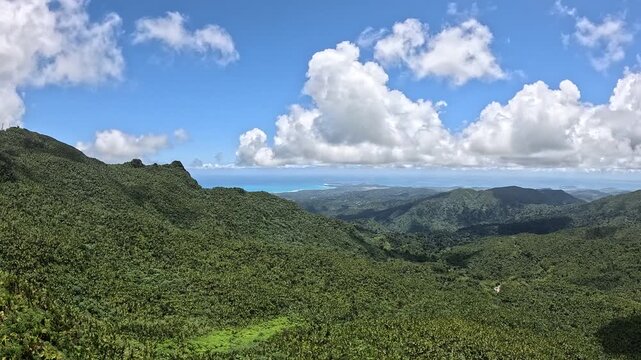 El Yunque Mountaintop Timelapse Over Rainforest Mountains and Distant Ocean in Puerto Rico