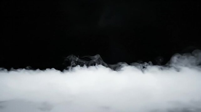 Thick Fog Rolling Low Over Surface on Black Background. 4K Video