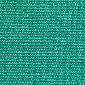 Green woven fabric texture close up