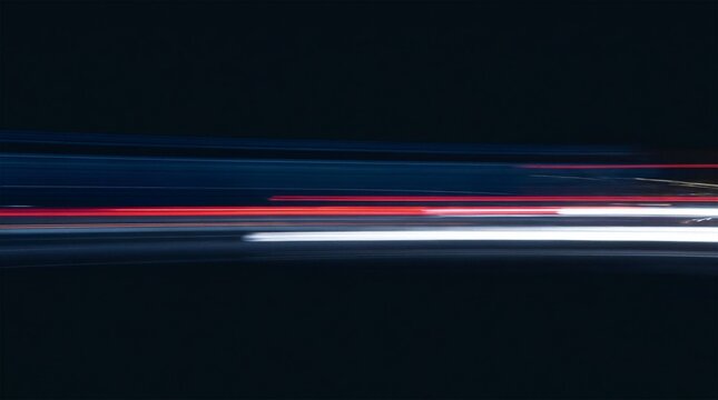 Abstract horizontal light trails in dark background featuring red and blue glowing streaks representing urban motion and fast transportation
