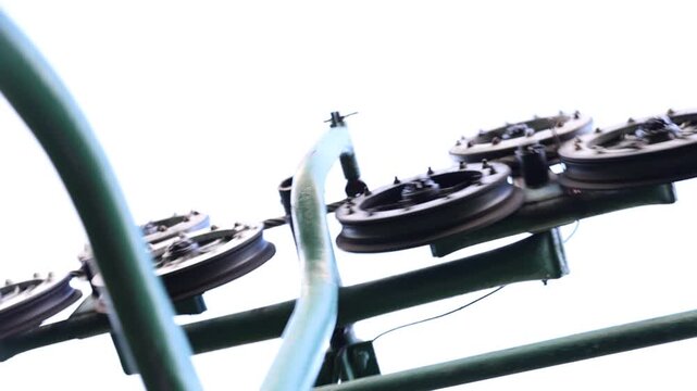 Close-Up of Zip Line Pulley Wheels on Cable