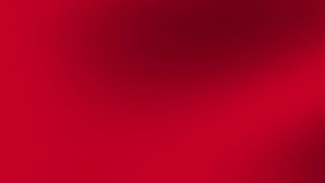Abstract red wavy liquid texture background flows smoothly