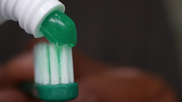 Brushing with green paste and soft brush