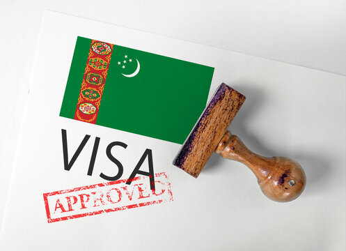 Turkmenistan Visa Approved with Rubber Stamp and flag
