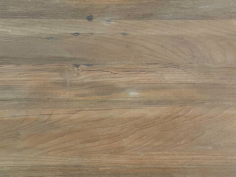 Rustic teak wood texture featuring warm brown and muted grey tones, pronounced natural grain, weathered marks, and organic surface variation. Ideal for furniture, flooring, panels, interiors, and arch