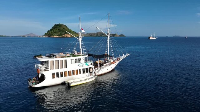 Aerial view of ship cruising on the sea in East Nusa Tenggara Islands, Komodo, Indonesia