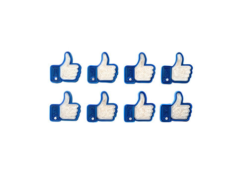 3D Printed Thumbs Up Icons on Black Background