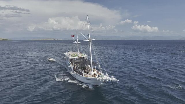 Aerial view of ship cruising on the sea in Komodo nation park, Indonesia