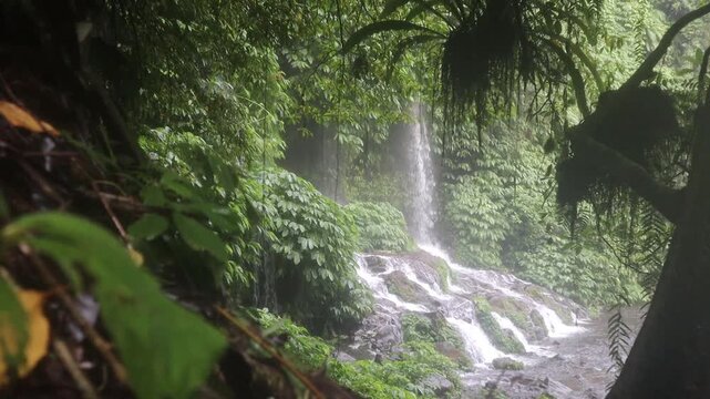 Benang Kelambu Waterfall Cascading Over Mossy Rocks at Batu Kliang Utara Lombok