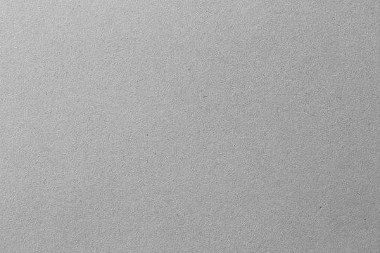 Gray paper texture, blank page of colorless cardboard background