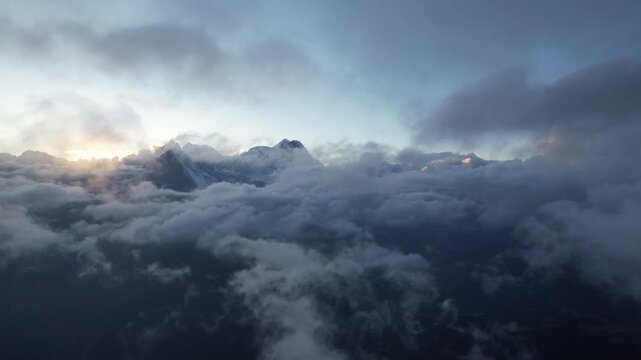 Aerial drone view of sea of clouds over Lantang Lirang Peak at Asia No.1 Viewing Platform in Gyirong, Tibet