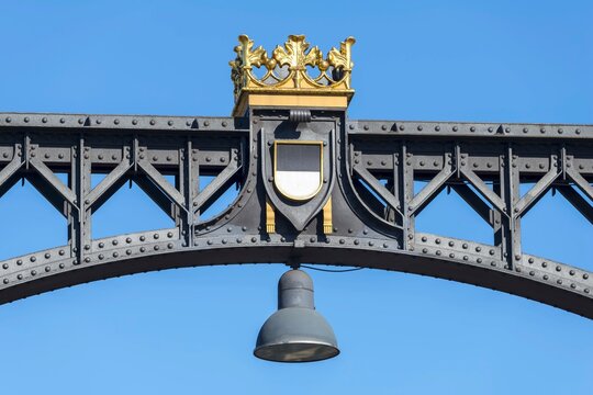 Decorated bridge element with golden crown, city coat of arms and lantern, embedded in the historic steel structure, Neutor Bridge, Ulm, Swabian Jura, Baden-W&uuml;rttemberg, Germany
