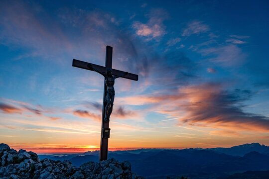 Summit cross of the Berchtesgaden High Throne at dawn, Untersberg, Bischofswiesen, Berchtesgadener Land, Upper Bavaria, Bavaria, Germany