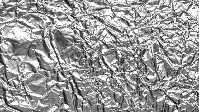 Shiny metal silver gray foil leaf crumpled texture background