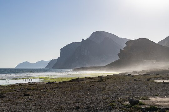 Backlight of Mughsail beach and the mountains, Salalah, Oman