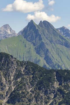 Summer in the Alps, mountain panorama from Fellhorn 2037 m, of the green grassy H&ouml;fats, 2259 m, Hochvogel in the back left, 2592 m, and on the right Kleiner Wilder, 2306 m, Allg&auml;u Alps, Bavaria, Germany