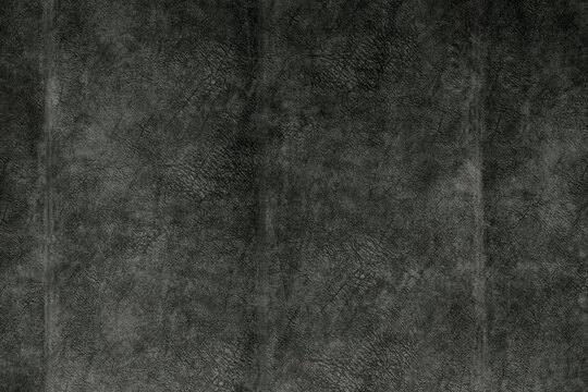 Dark textured background adds depth and dimension to visual projects