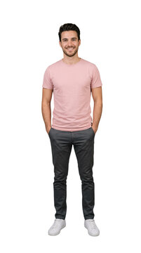 Caucasian man smiling wearing a pink tee shirt and gray pants standing