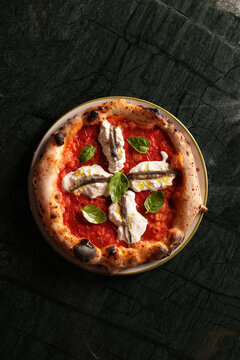 Neapolitan Pizza with Stracciatella Cheese Anchovies and Basil