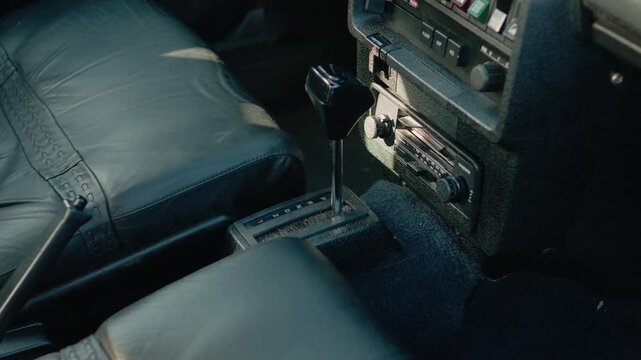 The automatic transmission of a classic Swedish Volvo 262C Bertone. The vehicle features a unique design and functional interior components.