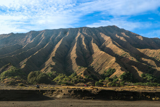 Majestic Volcanic Ridges and Mountain Slopes with Off-Road Jeeps at Mount Bromo Tengger Semeru National Park Indonesia