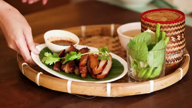 Traditional Thai Isan Food Set Served on Woven Bamboo Tray