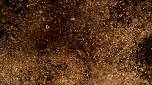 Super Slow Motion Shot of Tobacco Exploding Towards Camera at 1000fps.