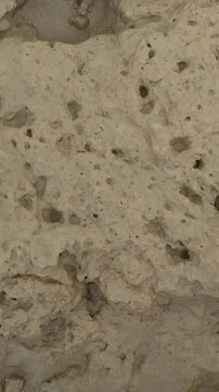 Textured Clay Ground with Small Water Channels and Pebbles
