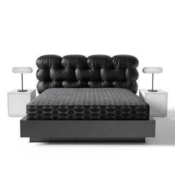 Modern black bed with tufted headboard and twin bedside lamps