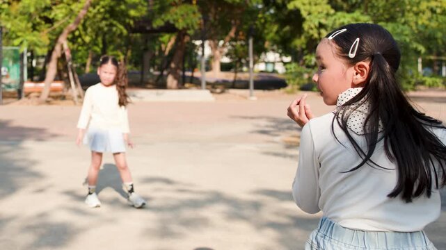 Young Thai Girls Playing with Hula Hoop in Lumpini Park