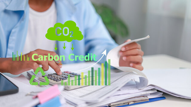 Businessman Calculating Carbon Credit and ESG Accounting Concept