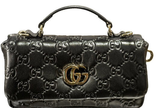 Gucci mini handbag in black leather with an all-over GG pattern and a golden logo on the flap. Milan - Italy,09 September 2026