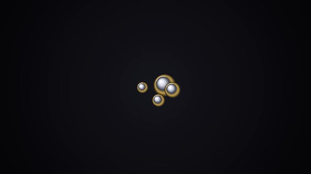 Slow Motion Of Silver And Gold Spheres In Dark Environment With Cinematic 4K Footage For Technology And Science