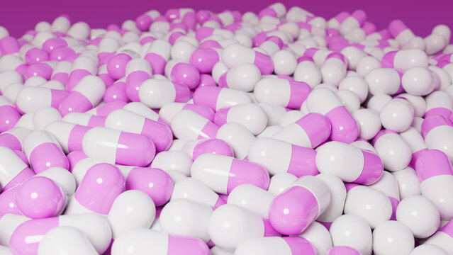 Close-up of a pile of glossy purple and white capsules