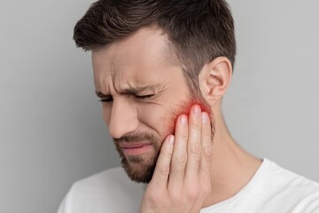 Fototapeta premium Young Man Suffering From Wisdom Tooth Pain
