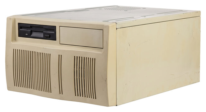 Vintage beige desktop computer tower with floppy drive