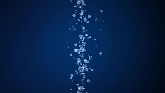 White decorative snowflakes falling in a vertical stream against dark blue background for festive holiday