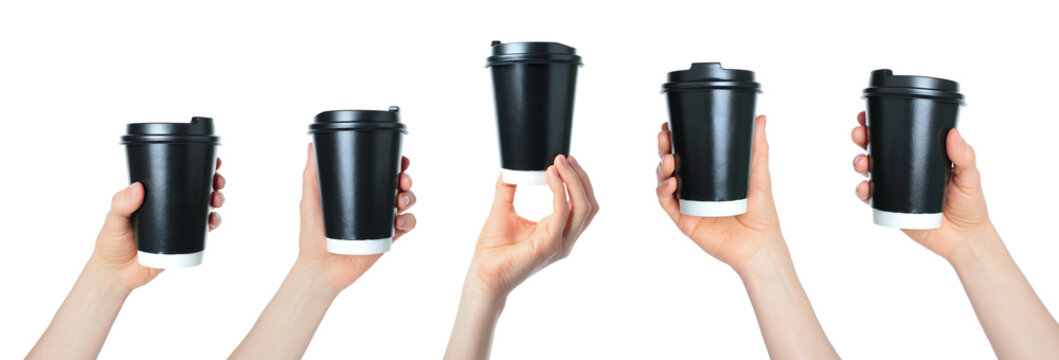 Hand holding a black paper coffee cup. Clean studio lighting, texture, isolated on transparent background. Perfect for branding, packaging, and advertising use