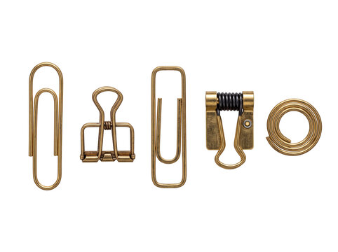Brass paper clips metal fasteners set arranged on black background, retro brass binder clip, vintage office stationery supplies collection for business, organization, and creative design context.