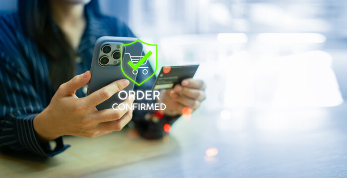 Customer confirming an online purchase on smartphone with order success icon.order confirmed,success,purchase,receipt,representing e-commerce completion,digital payment and retail transaction concept