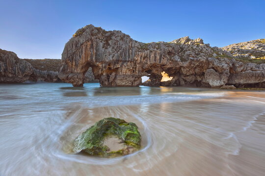 Playa Cuevas del Mar Beach, scenic karst area stated a Natural Monument due to the geological value of its rock formations. Llanes-Asturias-Spain-075