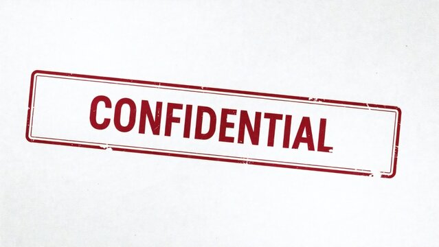Confidential red stamp on blurred background