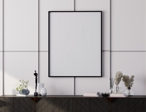 Luxury classic living room interior with blank gallery wall frames mockup, elegant molding details and stylish modern decor.