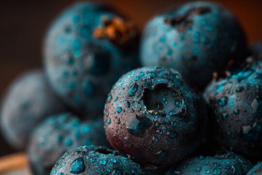 Fresh blueberries with water drops macro close up. Selective focus.