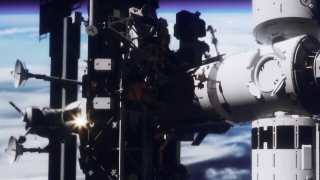 The view shows a space station in low Earth orbit. The structure has modules and solar panels. Earth clouds are visible below the station. The image captures a moment of space exploration.